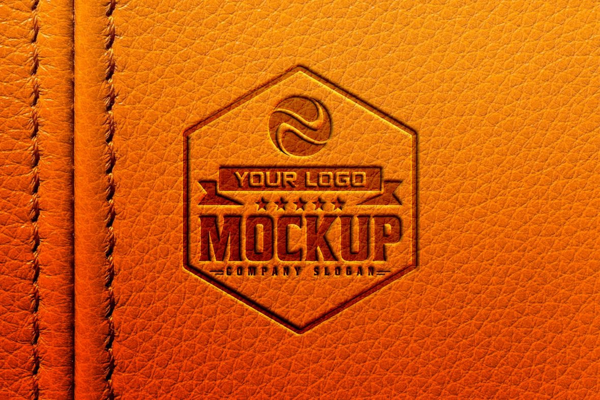 فایل موکاپ لوگو تیره روی زمینه چرم نارنجی - Dark Logo Mockup on Orange Leather Background