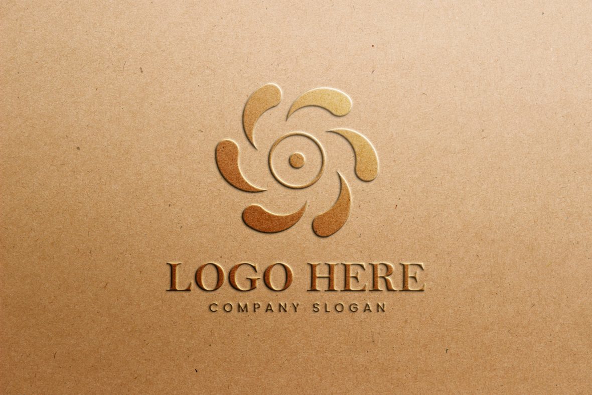 فایل ماکت لوگوی طلایی برجسته روی کاغذ کرافت - Embossed Gold Logo Mockup on Craft Paper