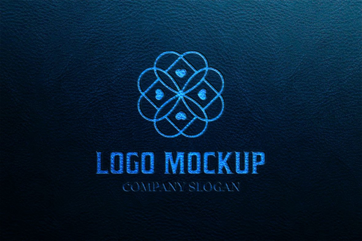 فایل موکاپ لوگو مهر برجسته روی زمینه چرم آبی تیره - Embossed Stamping Logo Mockup on Dark Blue Leather Background
