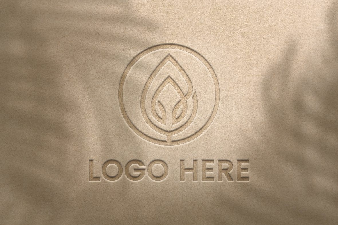 فایل موکاپ لوگو سه بعدی حکاکی شده روی زمینه پنبه ای خاکستری روشن - Engraved 3D Logo Mockup on Light Gray Cotton Background