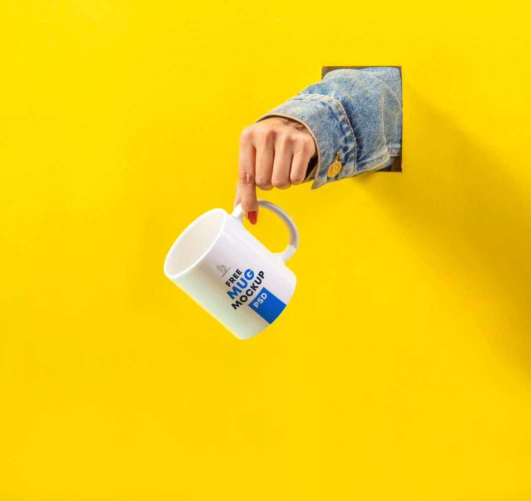فایل ماکت لیوان در دست - Mug in Hand Mockup