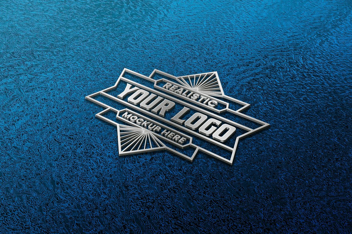 فایل موکاپ لوگوی نقره‌ای متالیک روی پس‌زمینه فویل آبی - Silver Metallic Logo Mockup On Blue Foil Background